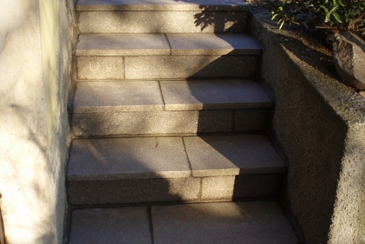 Scala (pedata e alzata) in porfido colori misti